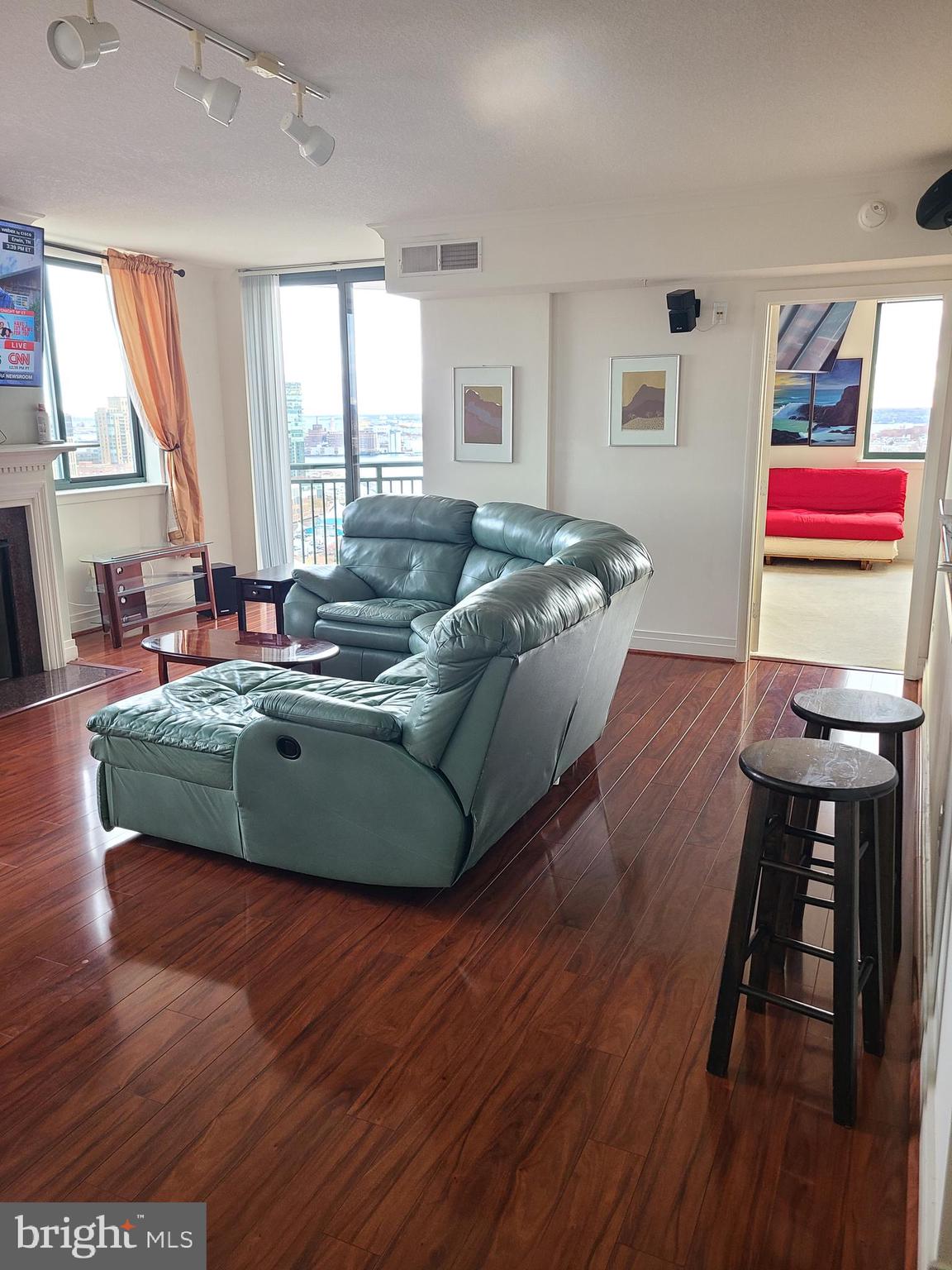 414 Water Street, Unit 2613 Baltimore, MD 21202 - Photo 3 of 42 a living room with furniture rug and window