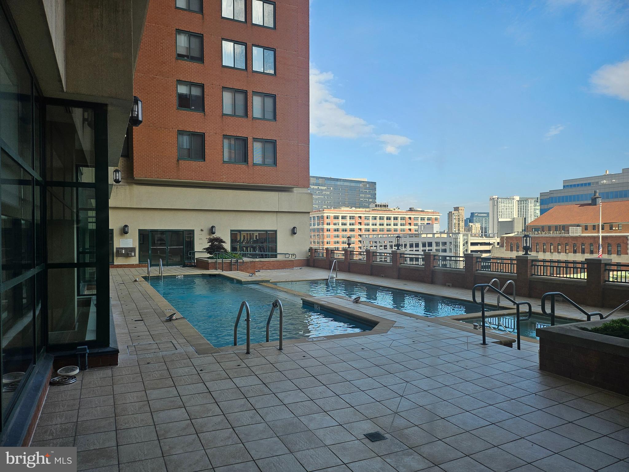 414 Water Street, Unit 2613 Baltimore, MD 21202 - Photo 41 of 42 a kitchen with a sink and cabinets