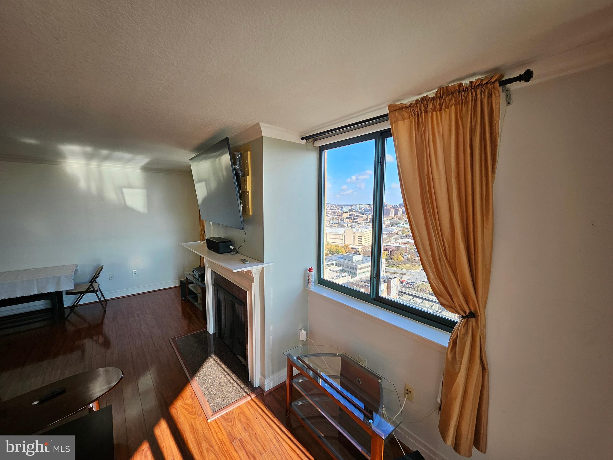 414 Water Street, Unit 2613 Baltimore, MD 21202 - Photo 7 of 42 a view of a livingroom with furniture and a window