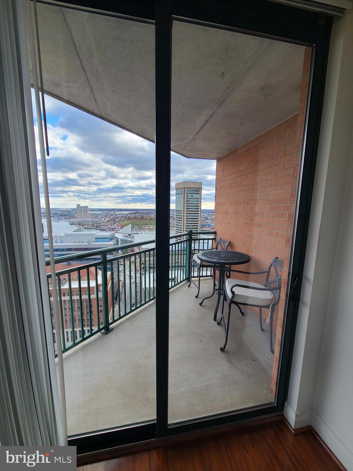 414 Water Street, Unit 2613 Baltimore, MD 21202 - Photo 10 of 42 a view of a hallway with chairs and furniture