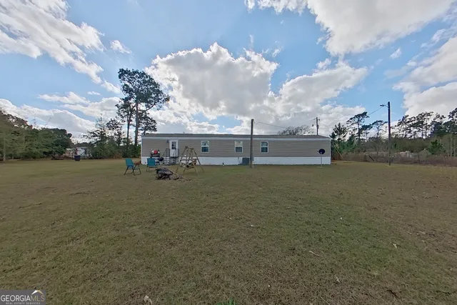 a view of a lake from a yard