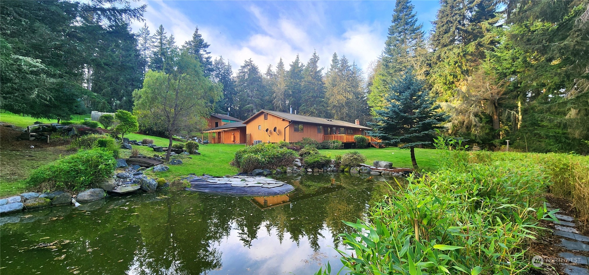 a view of a lake with a house