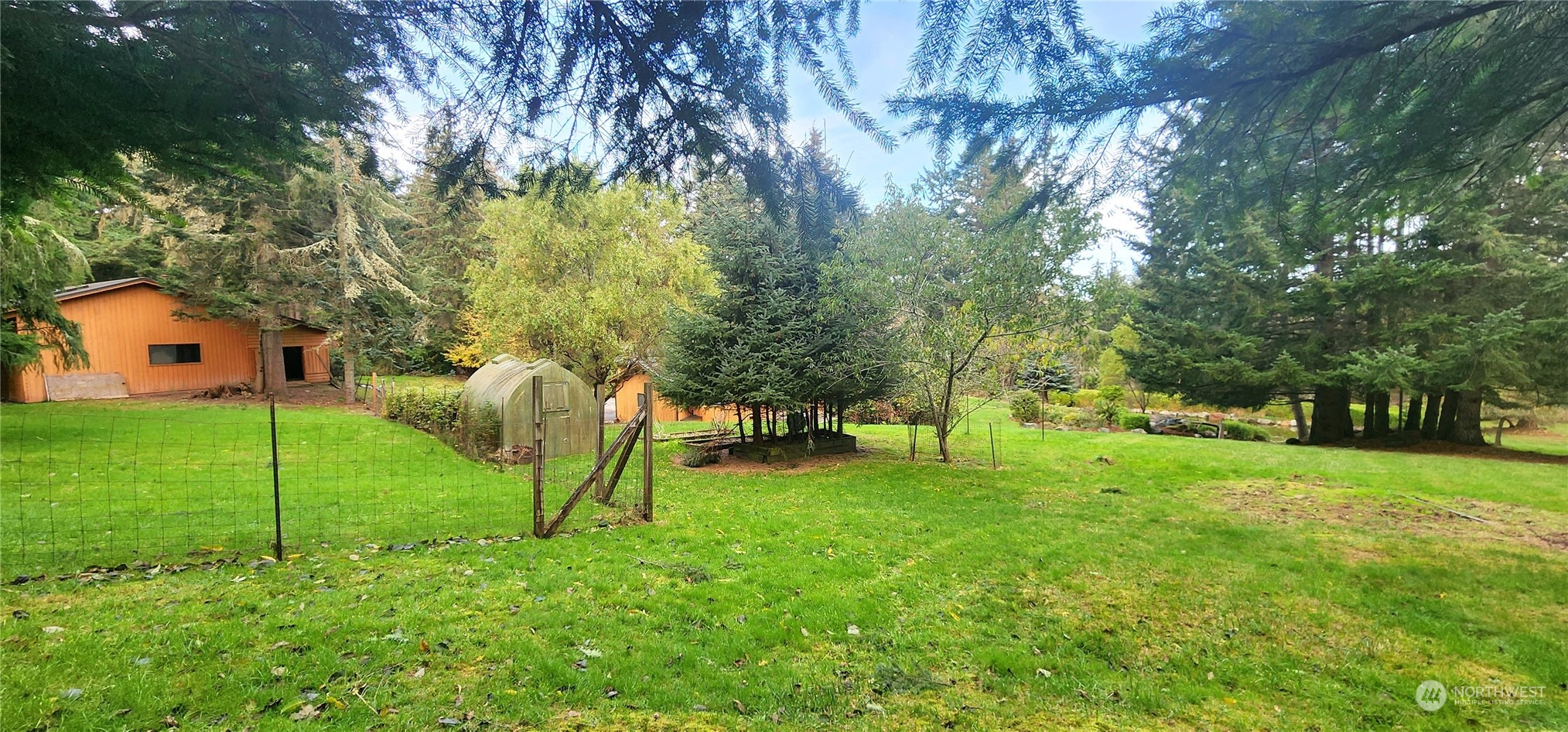 1230 Devries Road Oak Harbor, WA 98277 - Photo 28 of 39 a view of an house with a backyard