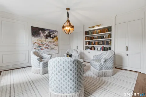 a living room with furniture and decor