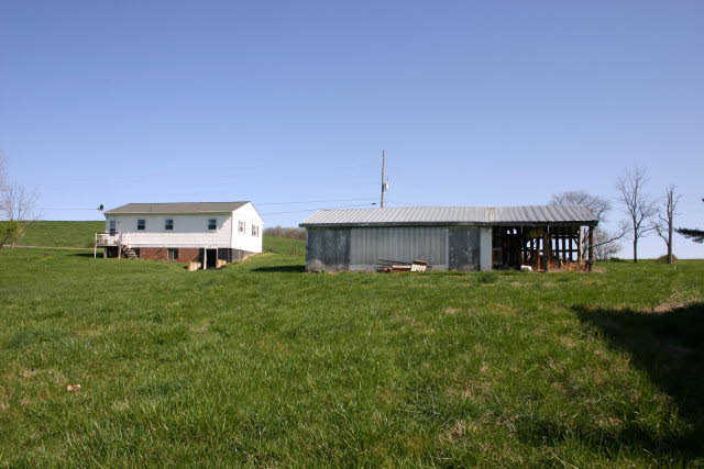 4816 Port Republic Road Harrisonburg, VA 22801 - Photo 4 of 7 a view of a house with a back yard
