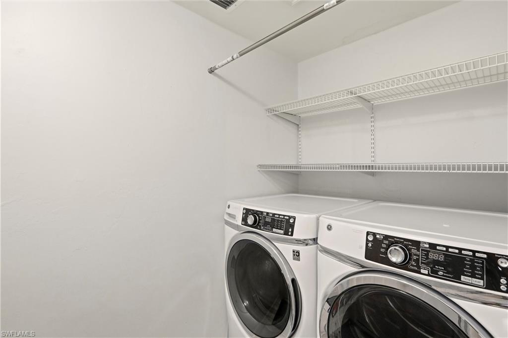 218 Marseille Drive Naples, FL 34112 - Photo 29 of 34 a utility room with dryer and washer