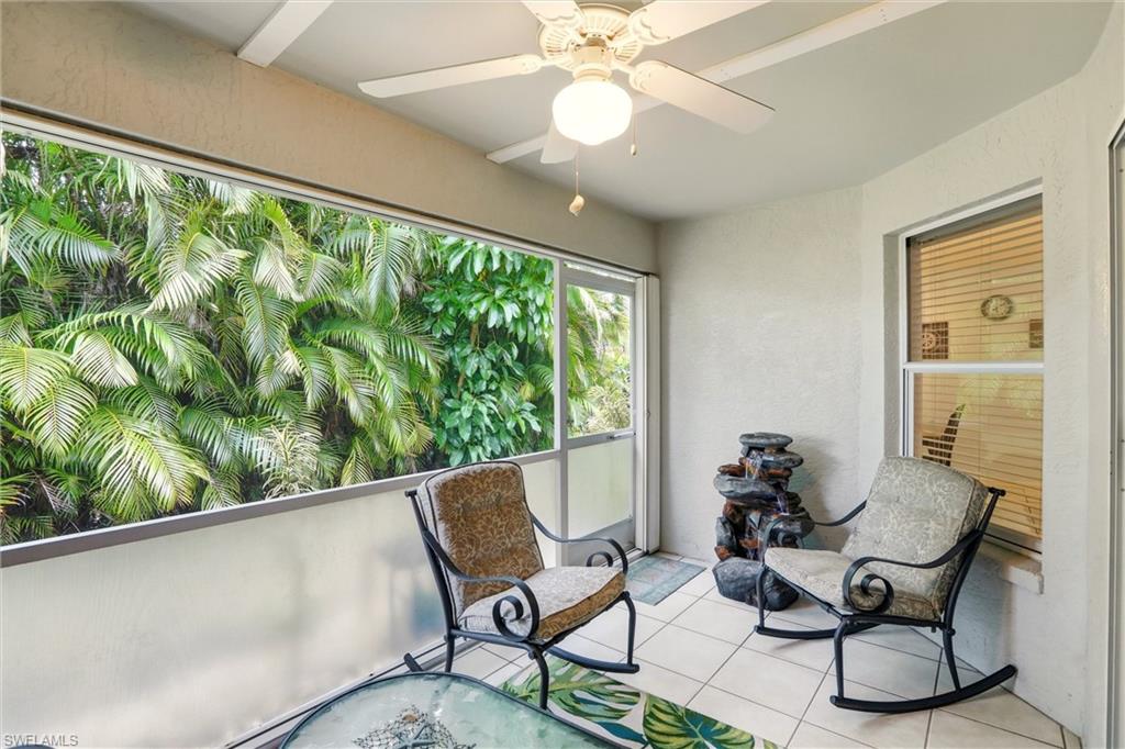 218 Marseille Drive Naples, FL 34112 - Photo 32 of 34 a view of a dining room with furniture window and outside view