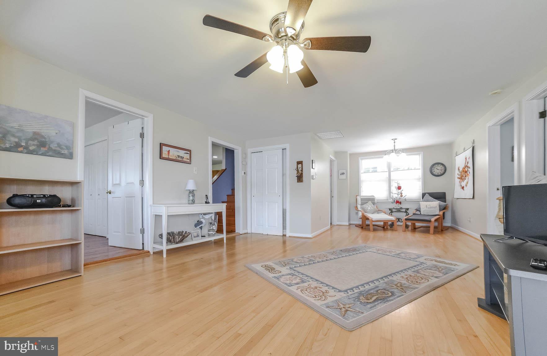 24496 Half Pone Point Road Hollywood, MD 20636 - Photo 10 of 53 Living room w/ gleaming hardwood flooring