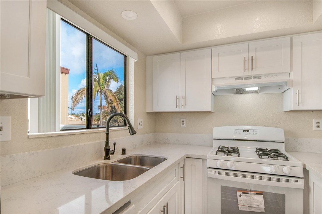 325 Encino Lane, Unit B San Clemente, CA 92672 - Photo 8 of 13 Another View of Remodeled Kitchen