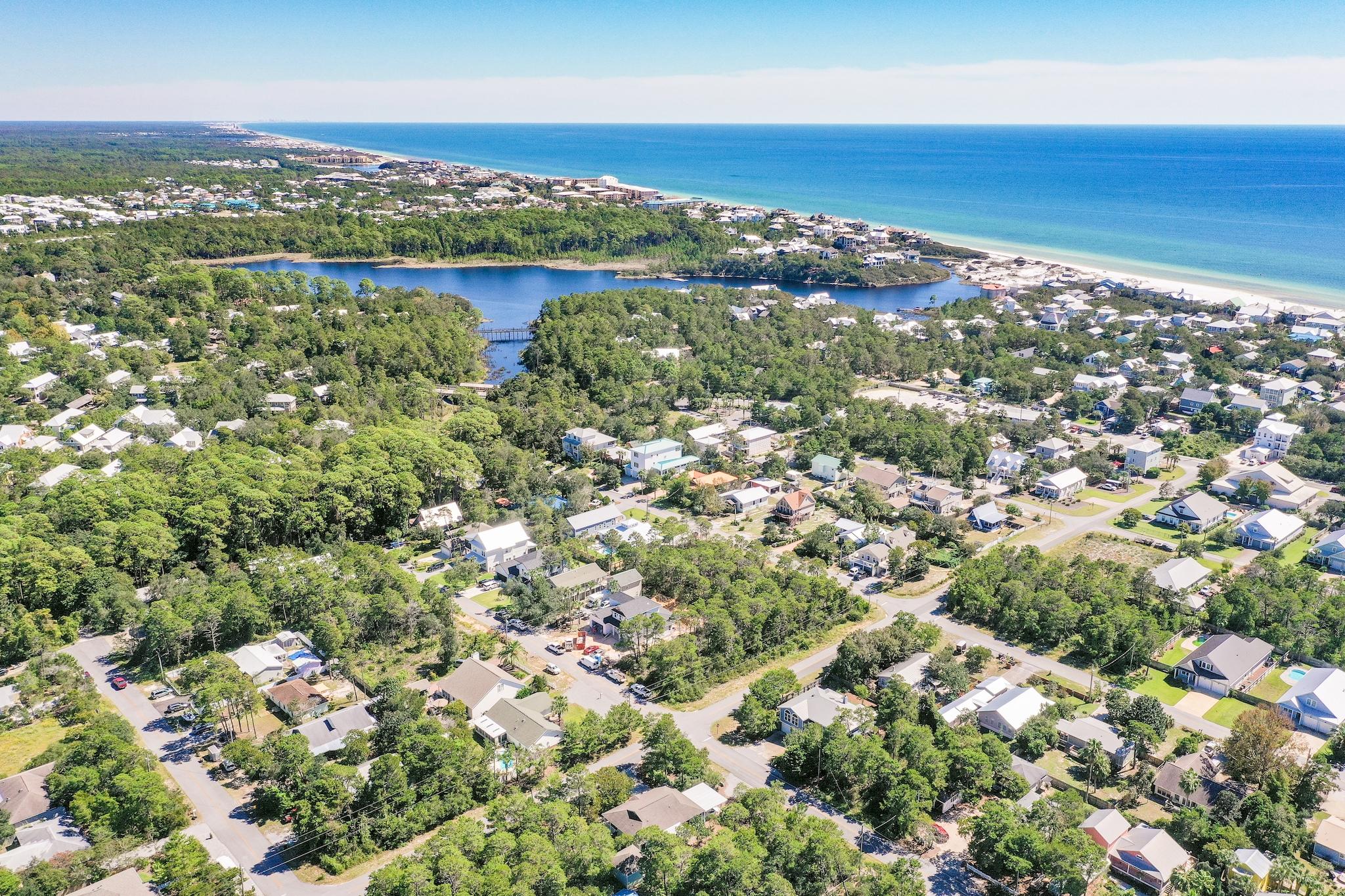 Lot 10 Bramble Street Santa Rosa Beach, FL 32459 - Photo 6 of 8 an aerial view of residential houses with outdoor space and trees