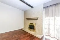 a view of a livingroom with a fireplace