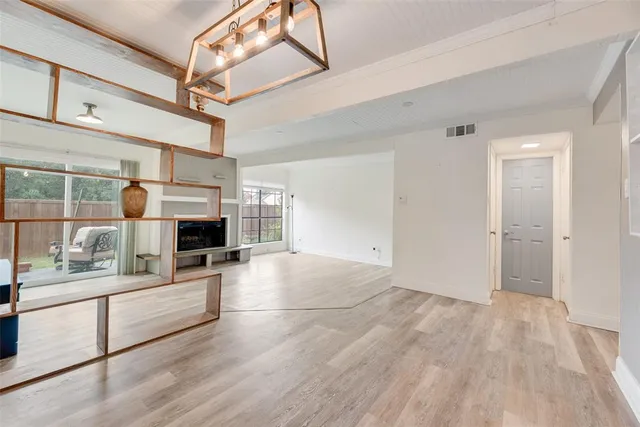a view of living room with furniture and flat screen tv