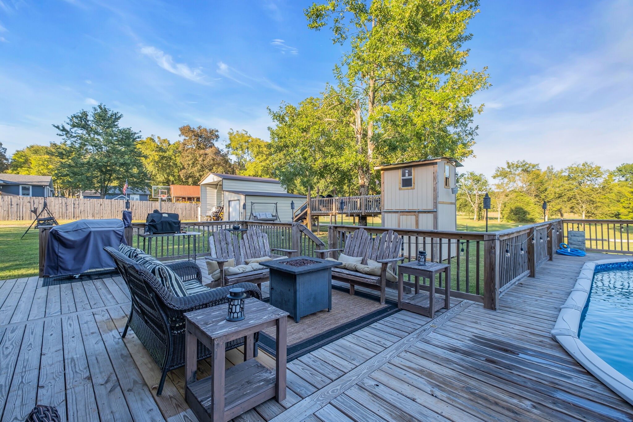 1399 Hamilton Chambers Road Lebanon, TN 37087 - Photo 33 of 40 a view of a balcony with wooden floor and outdoor seating