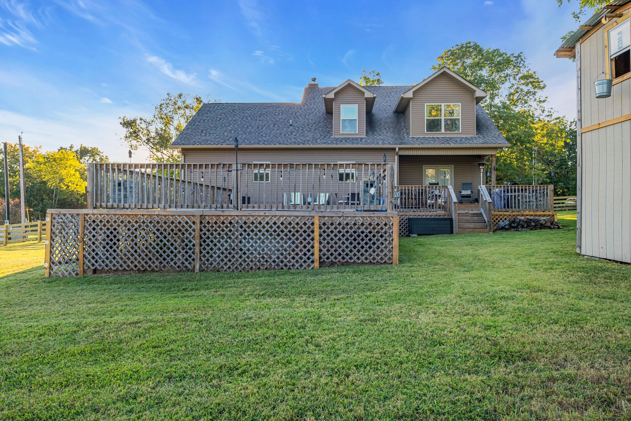 1399 Hamilton Chambers Road Lebanon, TN 37087 - Photo 39 of 40 a view of a house with a yard and deck