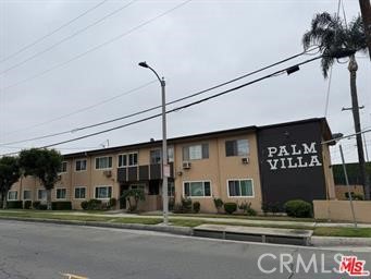 3060 Vineland Avenue, Unit 7 Baldwin Park, CA 91706 - Photo 1 of 14 a front view of a building with street