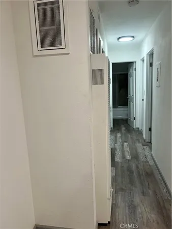 a view of hallway with livingroom