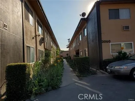 a view of a car parked in front of a house