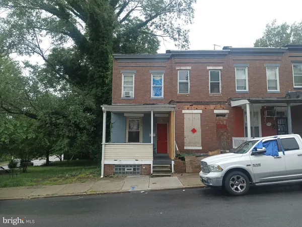a car parked in front of a house