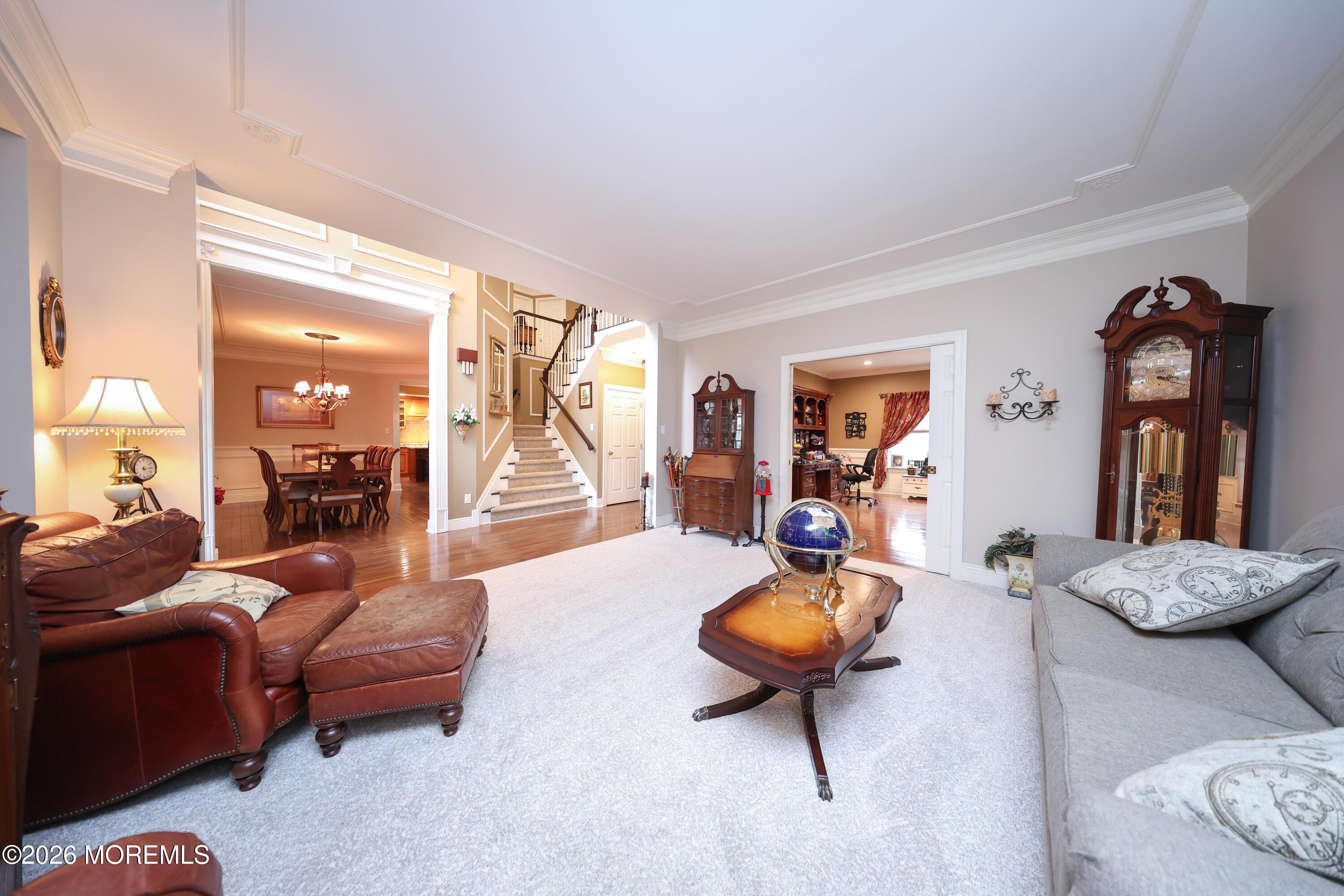 8 Clearbrook Court Howell, NJ 07731 - Photo 11 of 62 a living room with furniture and a wooden floor