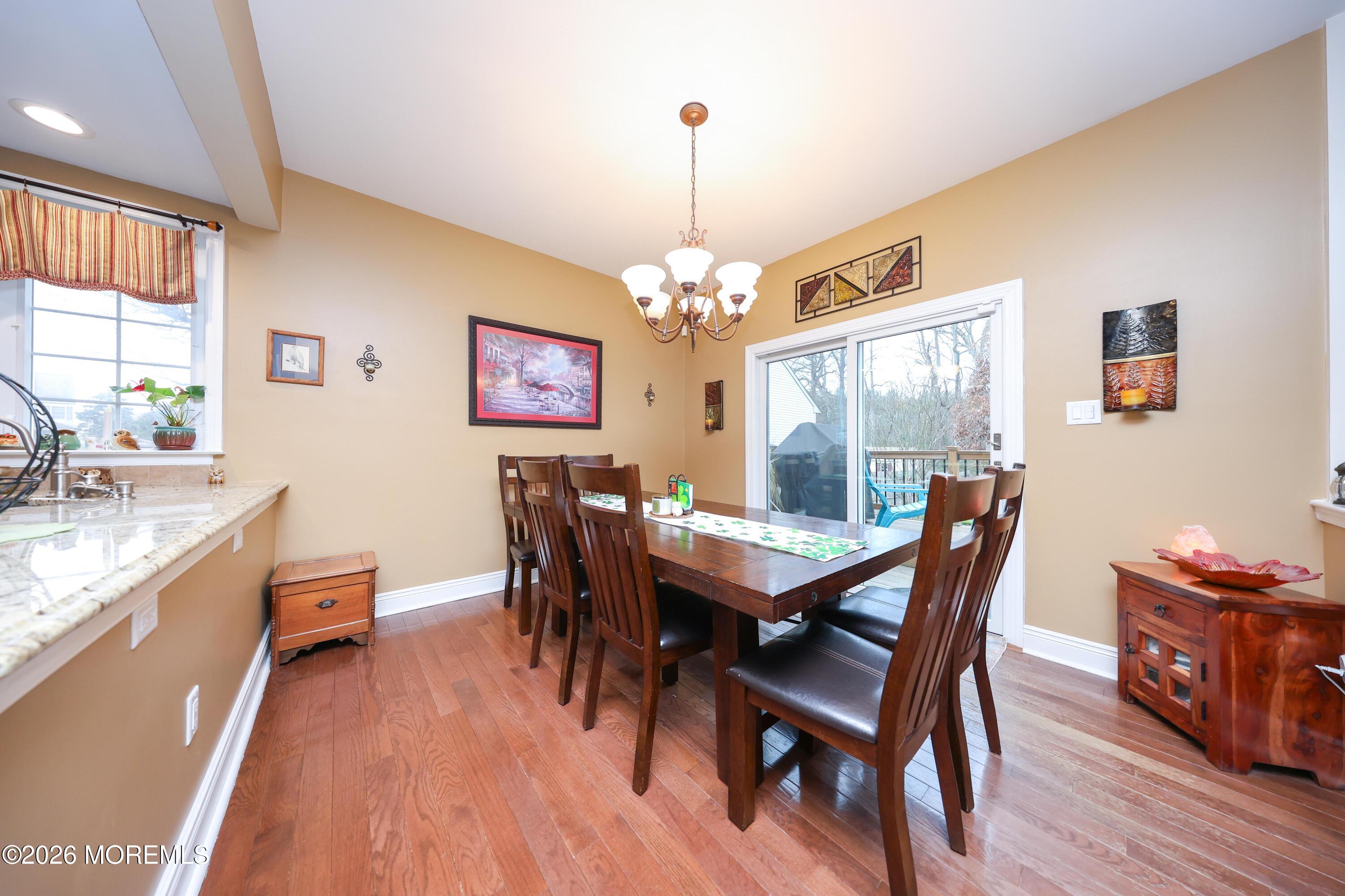 8 Clearbrook Court Howell, NJ 07731 - Photo 20 of 62 a view of a dining room with furniture window and wooden floor