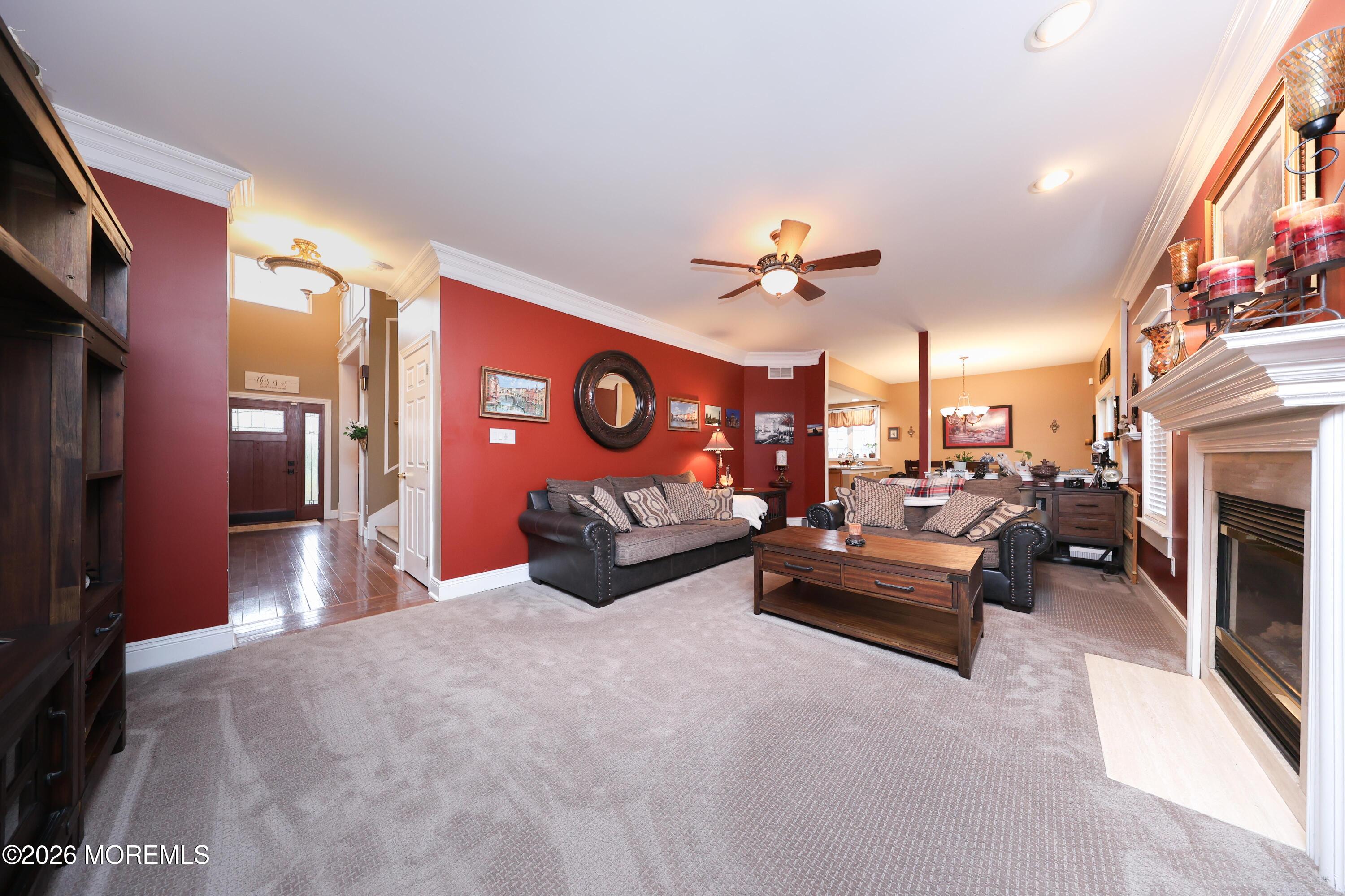 8 Clearbrook Court Howell, NJ 07731 - Photo 21 of 62 a view of a livingroom with furniture and a fireplace