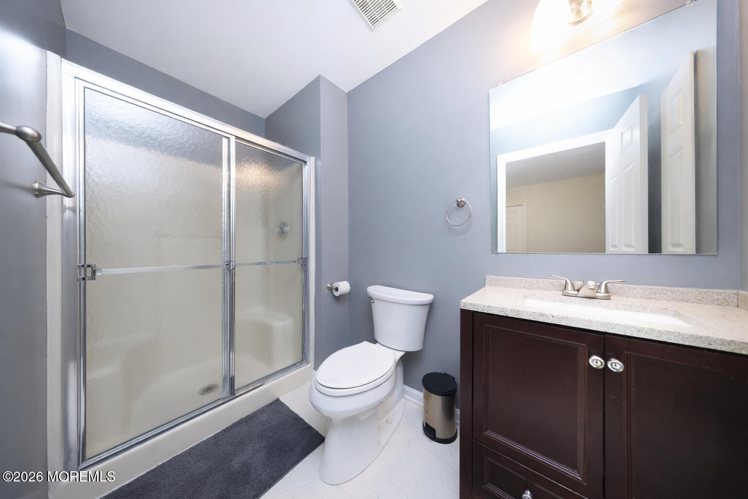 8 Clearbrook Court Howell, NJ 07731 - Photo 32 of 62 a bathroom with a toilet a sink and a mirror