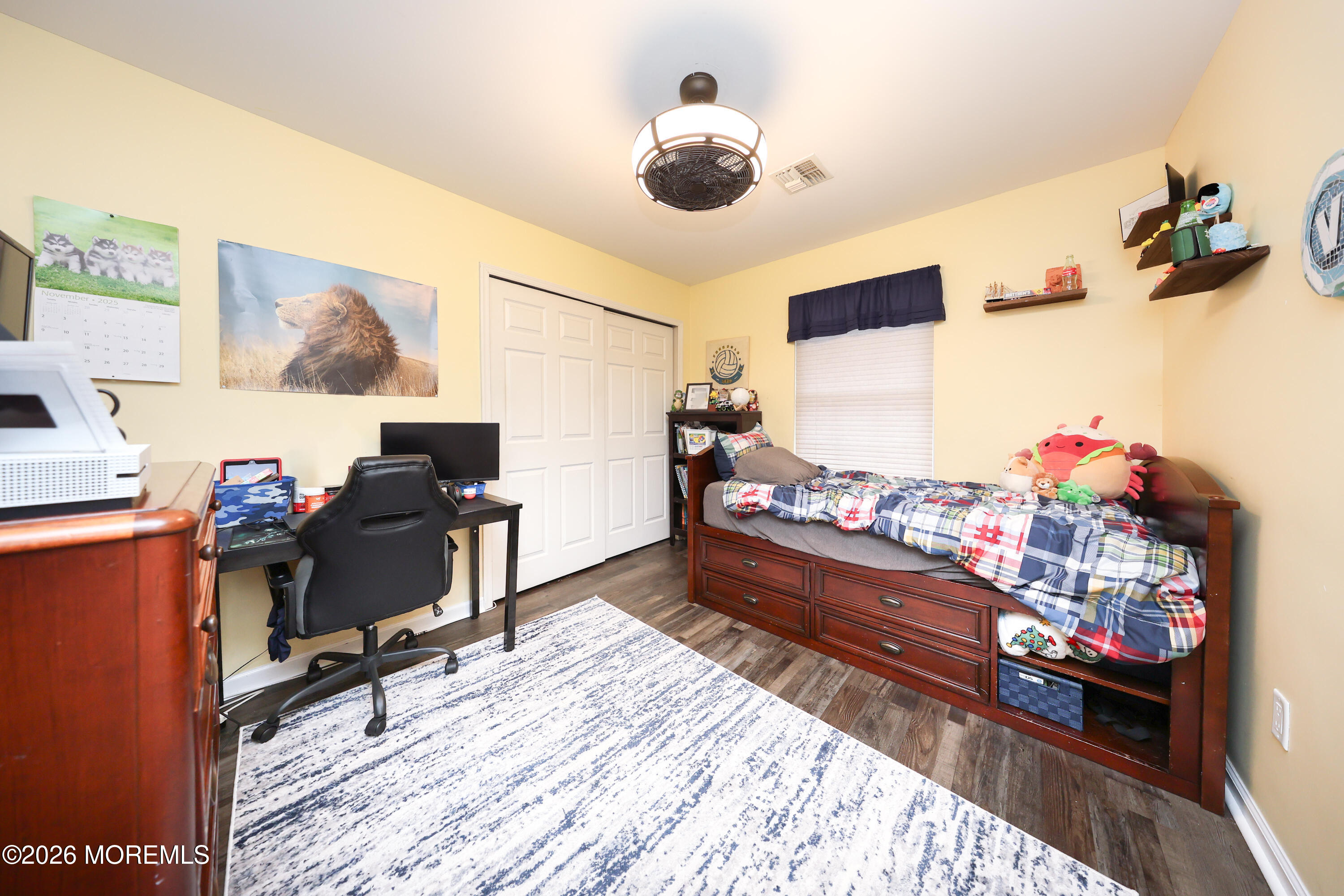 8 Clearbrook Court Howell, NJ 07731 - Photo 35 of 62 a room with wooden floor and musical instruments