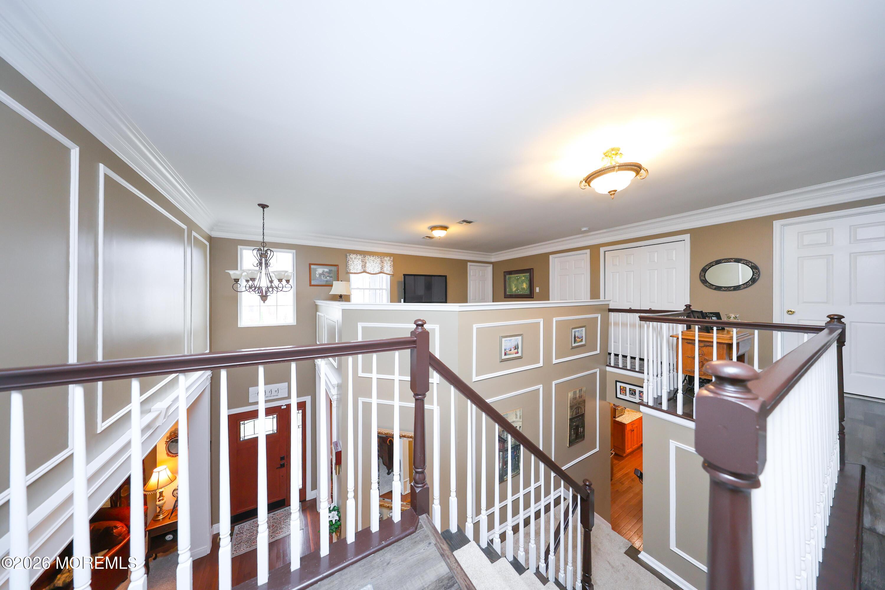 8 Clearbrook Court Howell, NJ 07731 - Photo 36 of 62 a view of entryway and hall with wooden floor