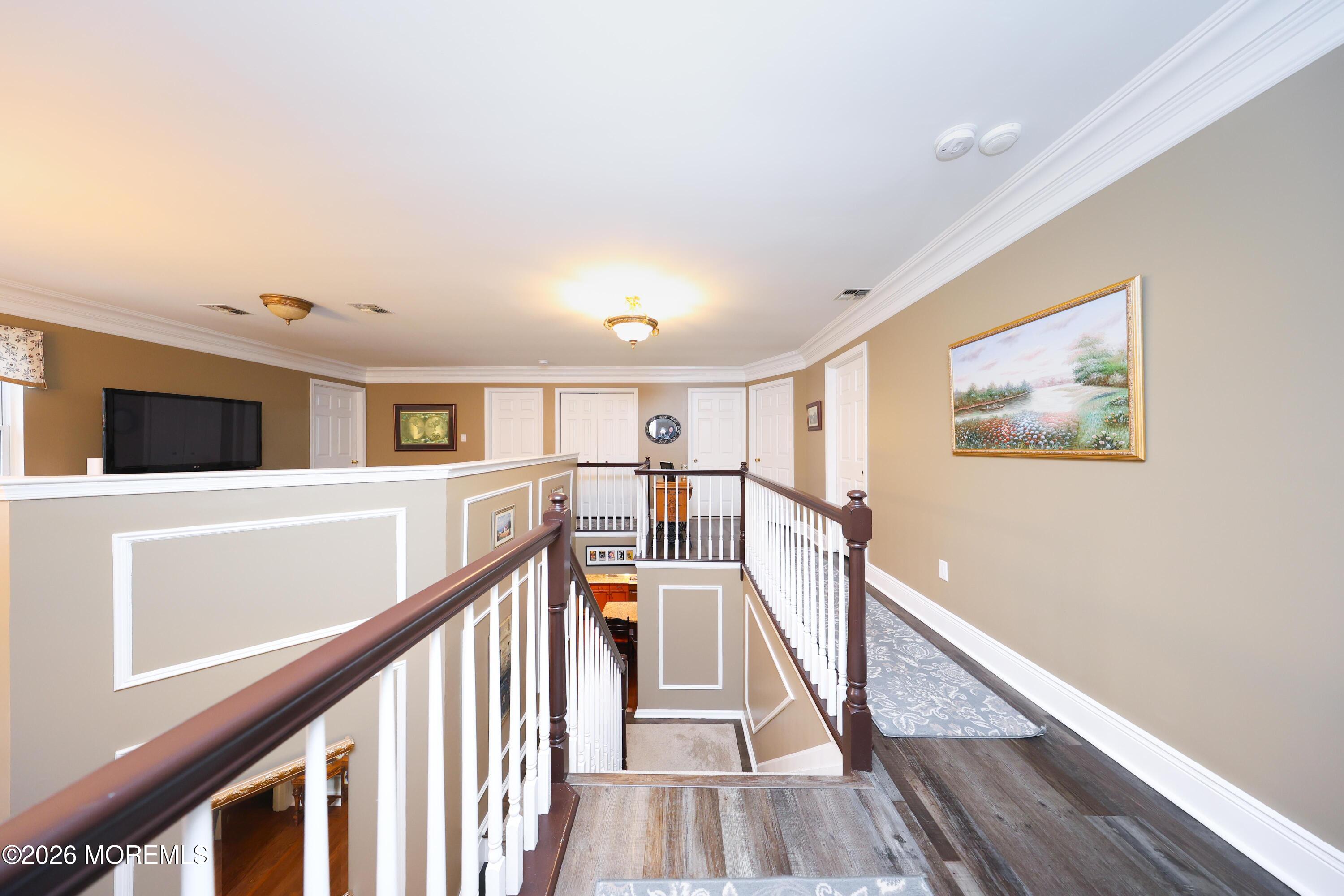 8 Clearbrook Court Howell, NJ 07731 - Photo 37 of 62 a view of a hallway with stairs