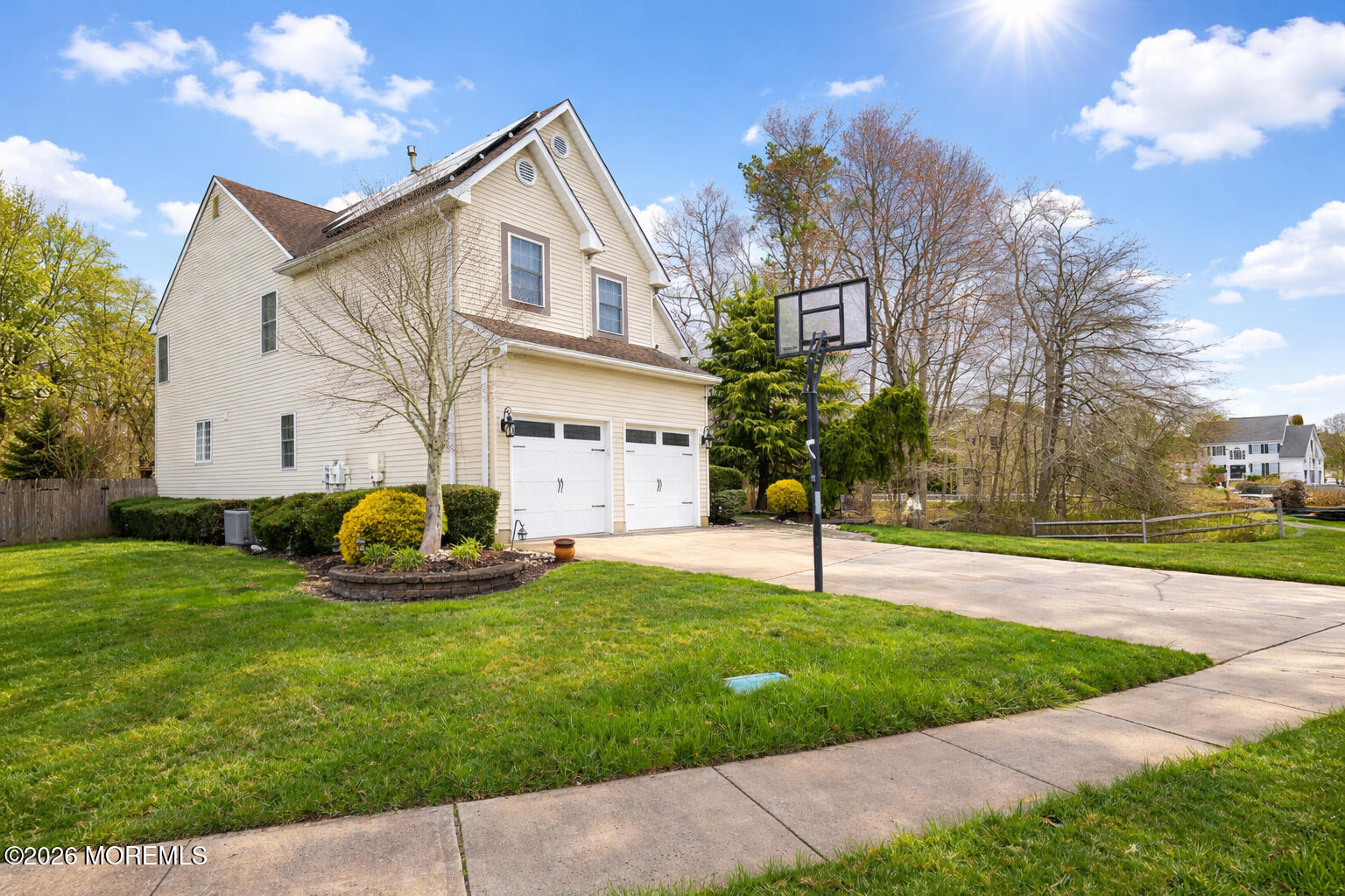8 Clearbrook Court Howell, NJ 07731 - Photo 4 of 62 a view of a white house in a back yard