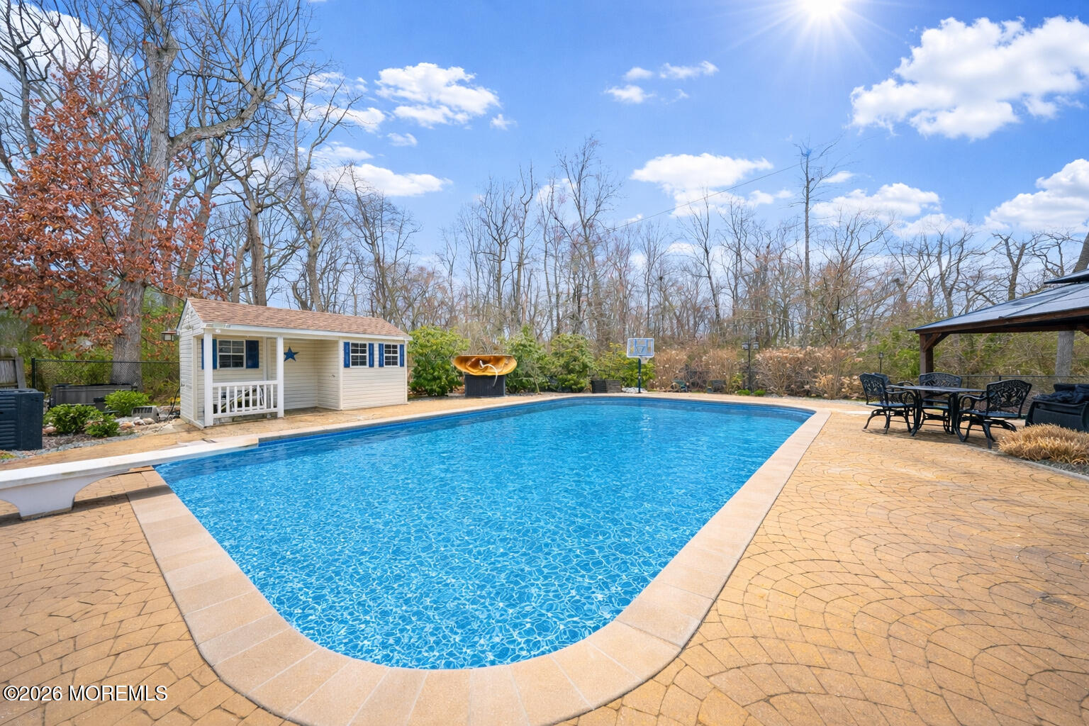 8 Clearbrook Court Howell, NJ 07731 - Photo 47 of 62 a view of a swimming pool with sitting area