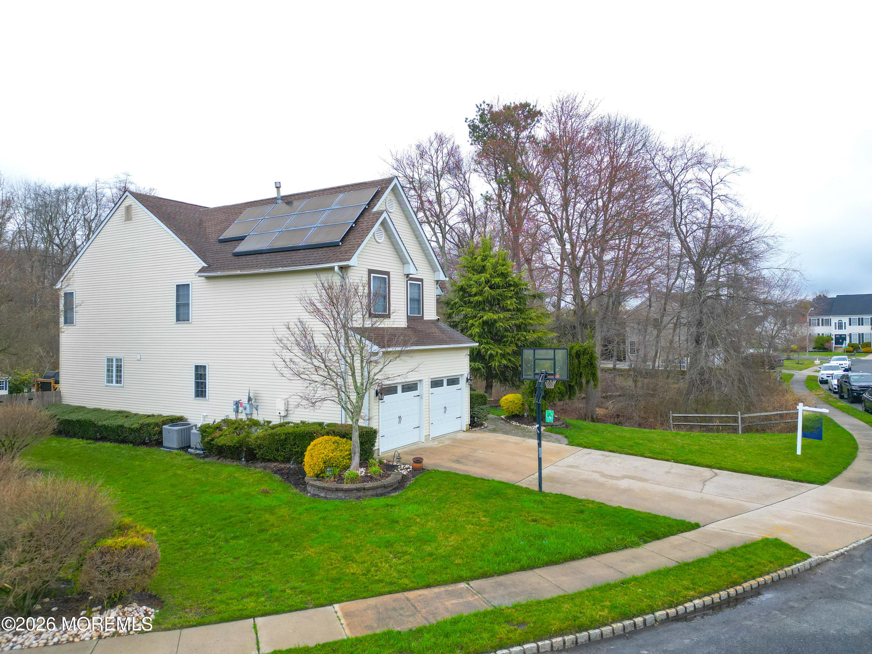 8 Clearbrook Court Howell, NJ 07731 - Photo 5 of 62 a view of a house with backyard