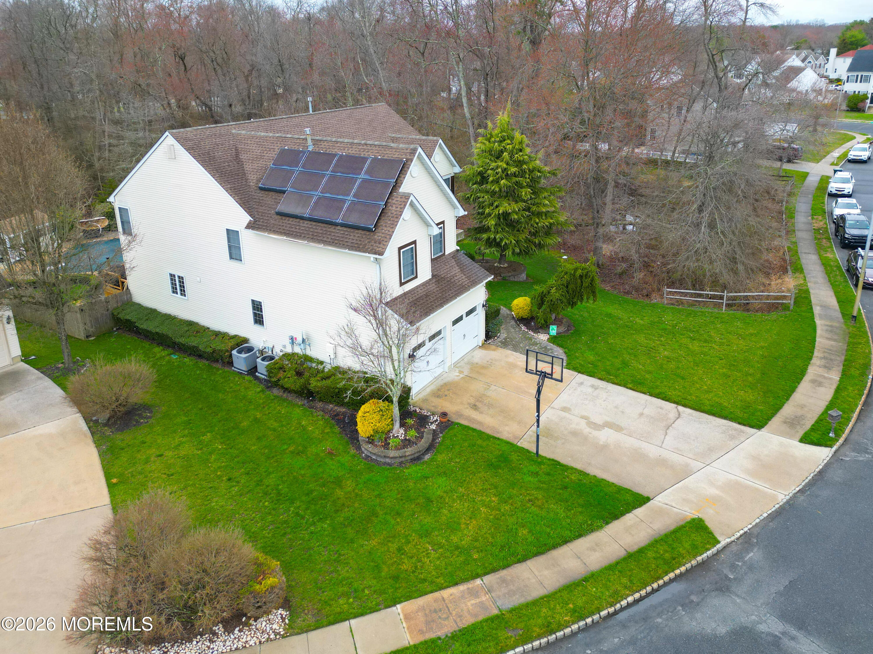 8 Clearbrook Court Howell, NJ 07731 - Photo 6 of 62 a view of a house with a yard and sitting area