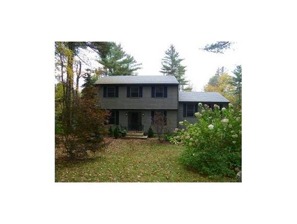 349 Deerfield Road, Unit R337 Allenstown, NH 03275 - Photo 1 of 10 a view of a house with a small yard and plants