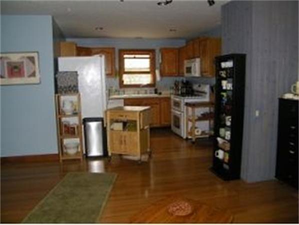 349 Deerfield Road, Unit R337 Allenstown, NH 03275 - Photo 3 of 10 a kitchen with stainless steel appliances a refrigerator and a stove top oven