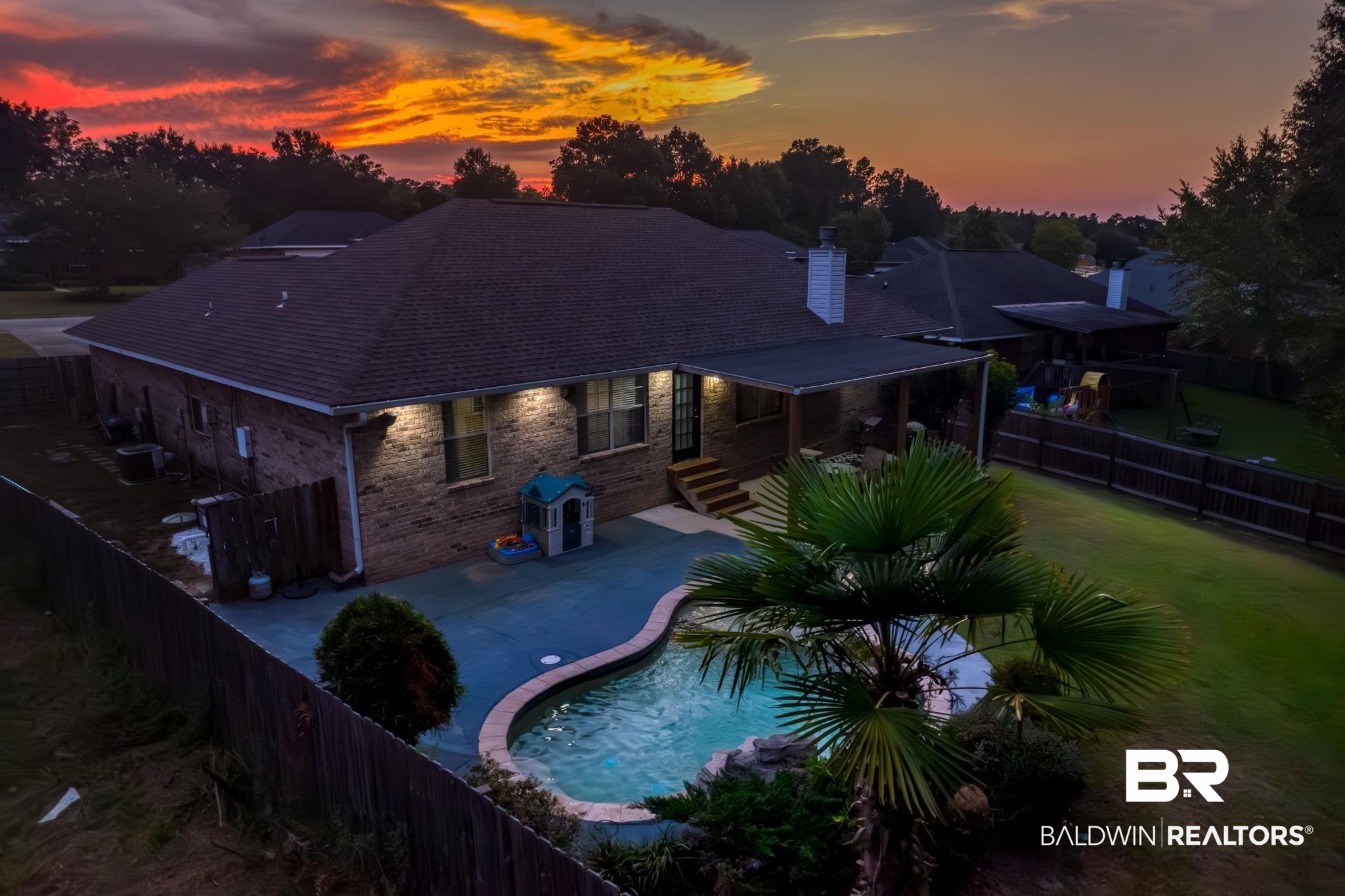 28246 Turkey Branch Drive Daphne, AL 36526 - Photo 2 of 41 Pool at dusk featuring a patio