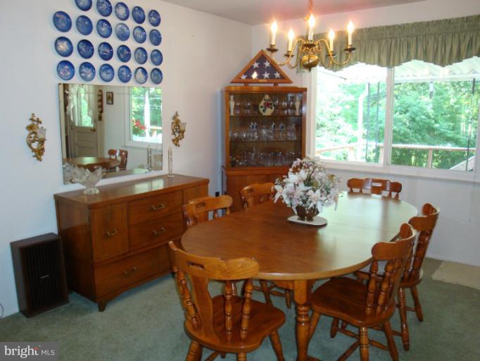 1900 Harewood Road Edgewood, MD 21040 - Photo 9 of 29 a dining room with furniture and window