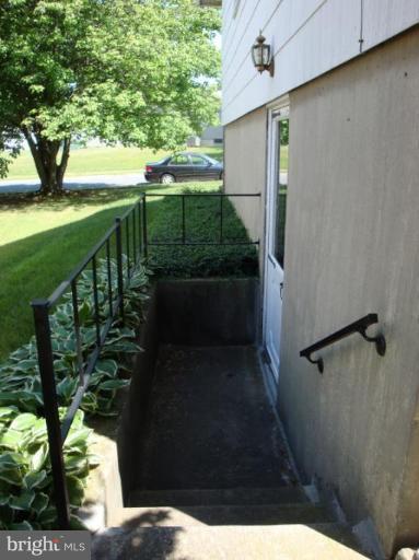 1900 Harewood Road Edgewood, MD 21040 - Photo 10 of 29 a balcony with trees in front of it