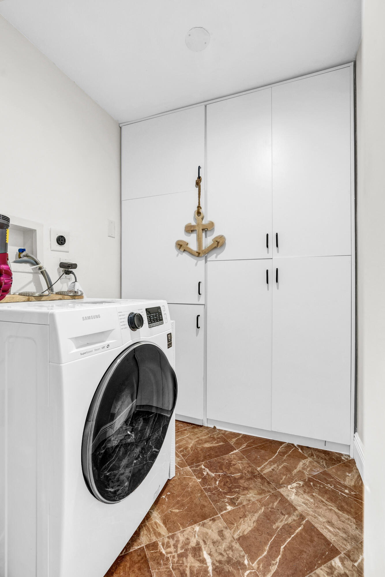 3050 Northeast 48th Court, Unit 305 Lighthouse Point, FL 33064 - Photo 32 of 45 Laundry Room