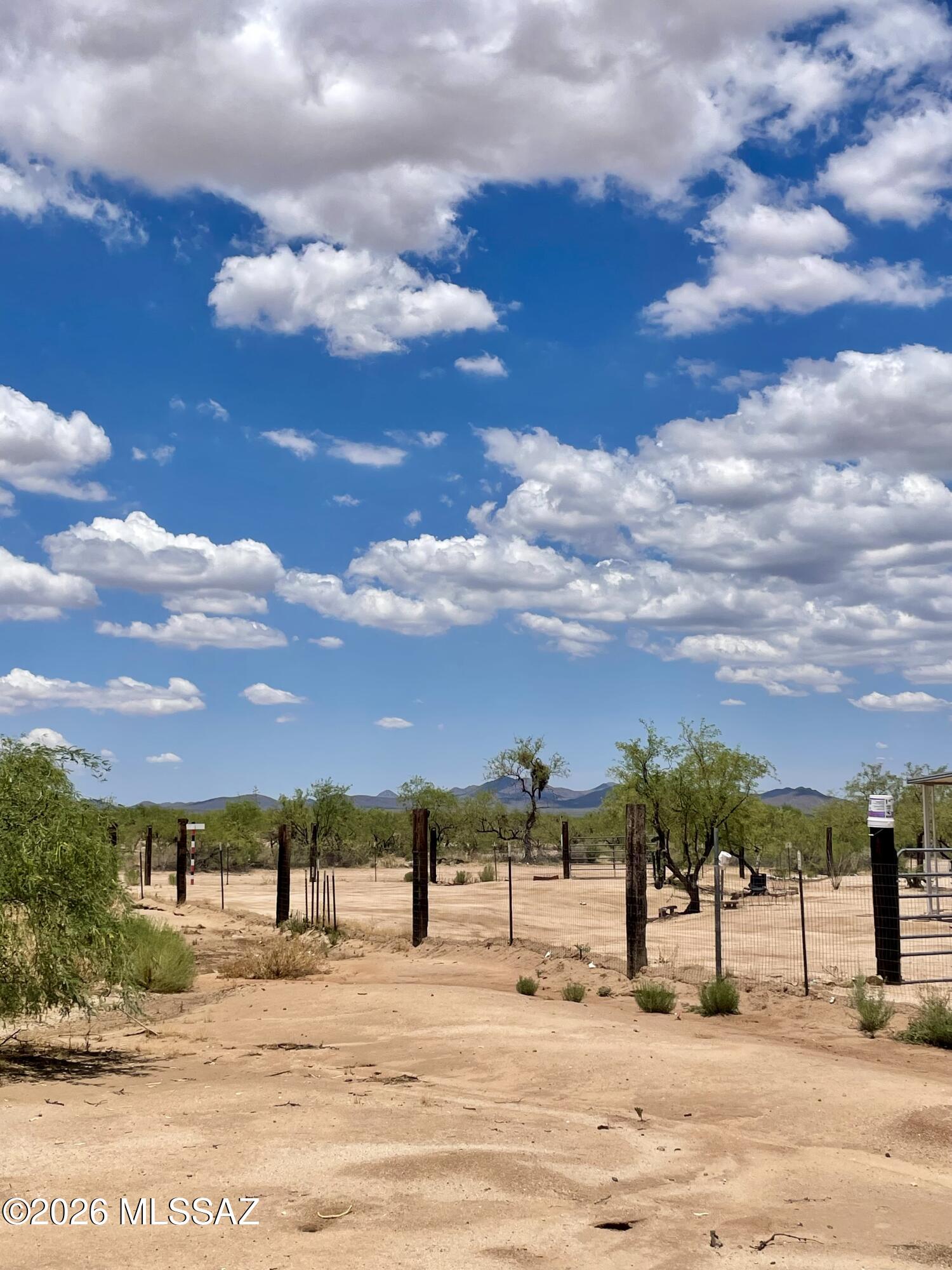 8535 South Marstellar Road Tucson, AZ 85736 - Photo 25 of 30 Northside of property shared welded wire