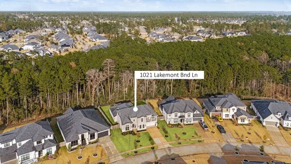 $775,000 | 1021 Lakemont Bend Lane, Pinehurst, TX 77362