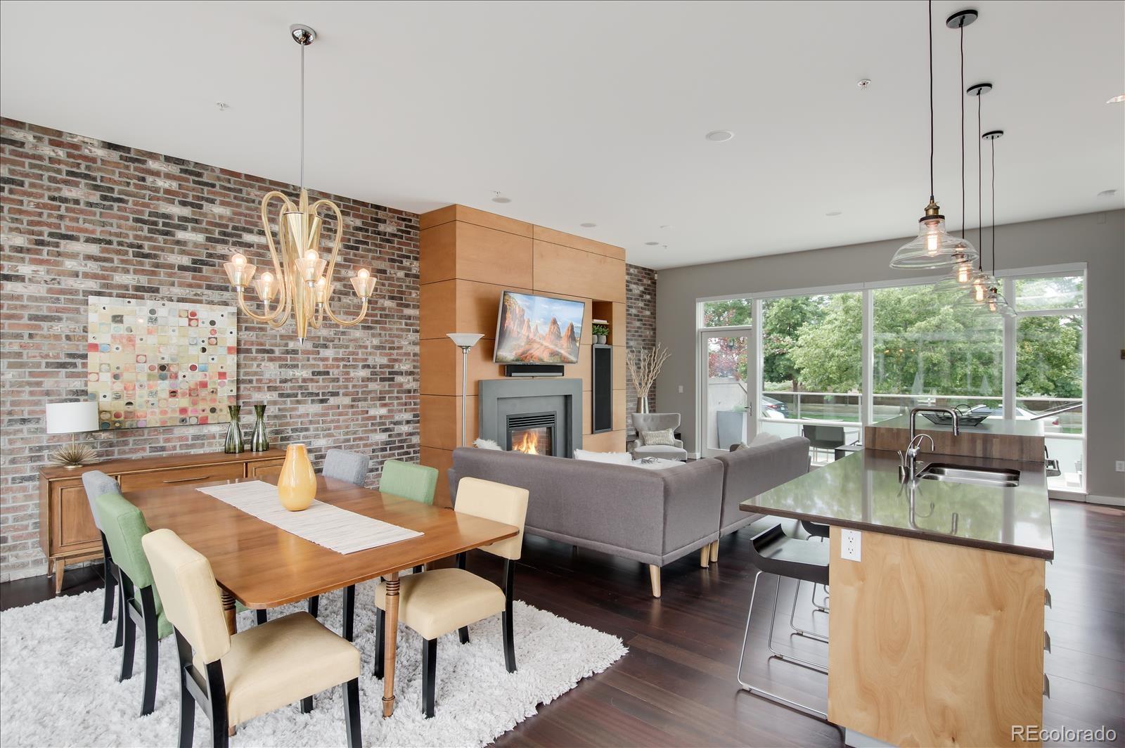 1640 Little Raven Street Denver, CO 80202 - Photo 13 of 37 a view of a dining room with furniture window and outside view