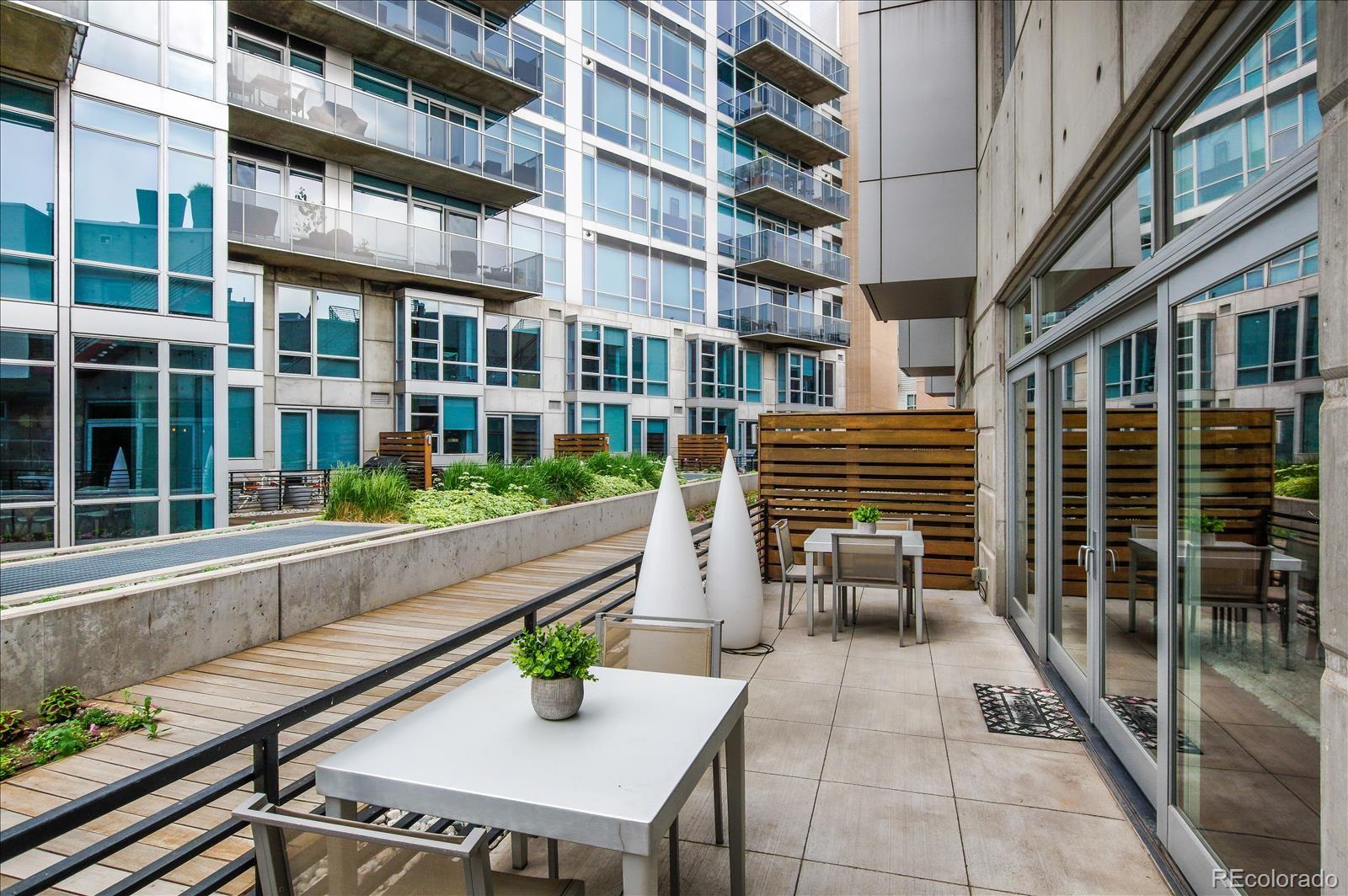 1640 Little Raven Street Denver, CO 80202 - Photo 16 of 37 a view of a building with sitting area