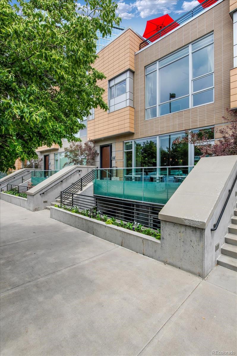 1640 Little Raven Street Denver, CO 80202 - Photo 2 of 37 front view of a house with a yard