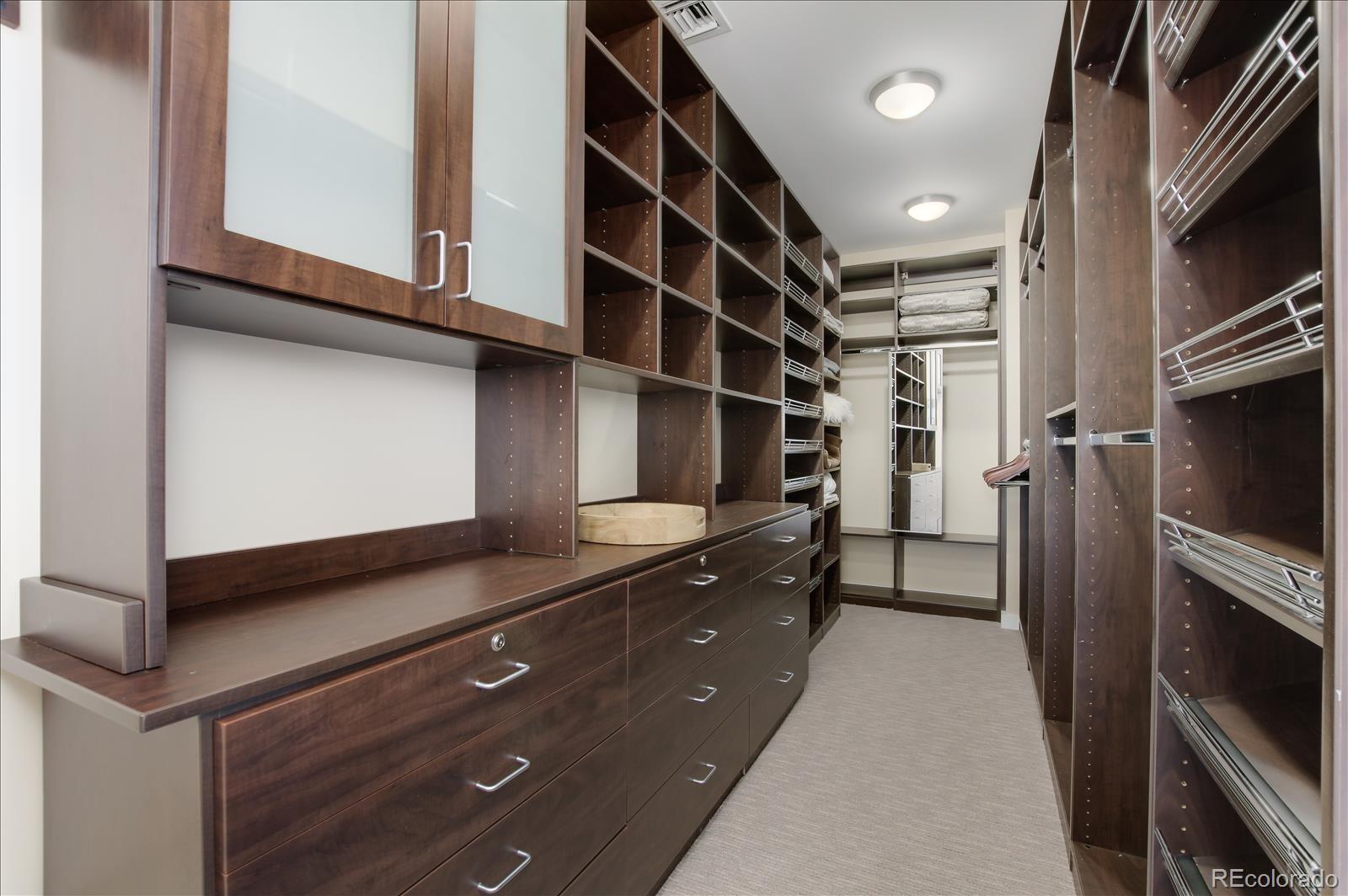 1640 Little Raven Street Denver, CO 80202 - Photo 21 of 37 a kitchen with stainless steel appliances a sink and a microwave
