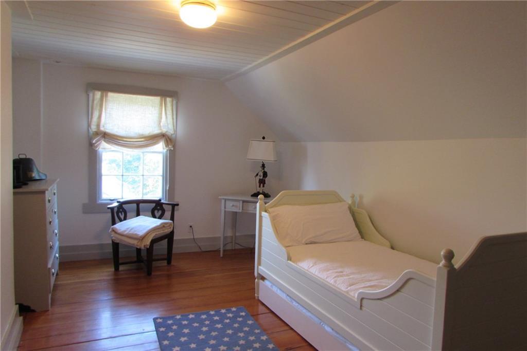 103 Main Street Castine, ME 04421 - Photo 29 of 35 Cozy Third floor bedroom.