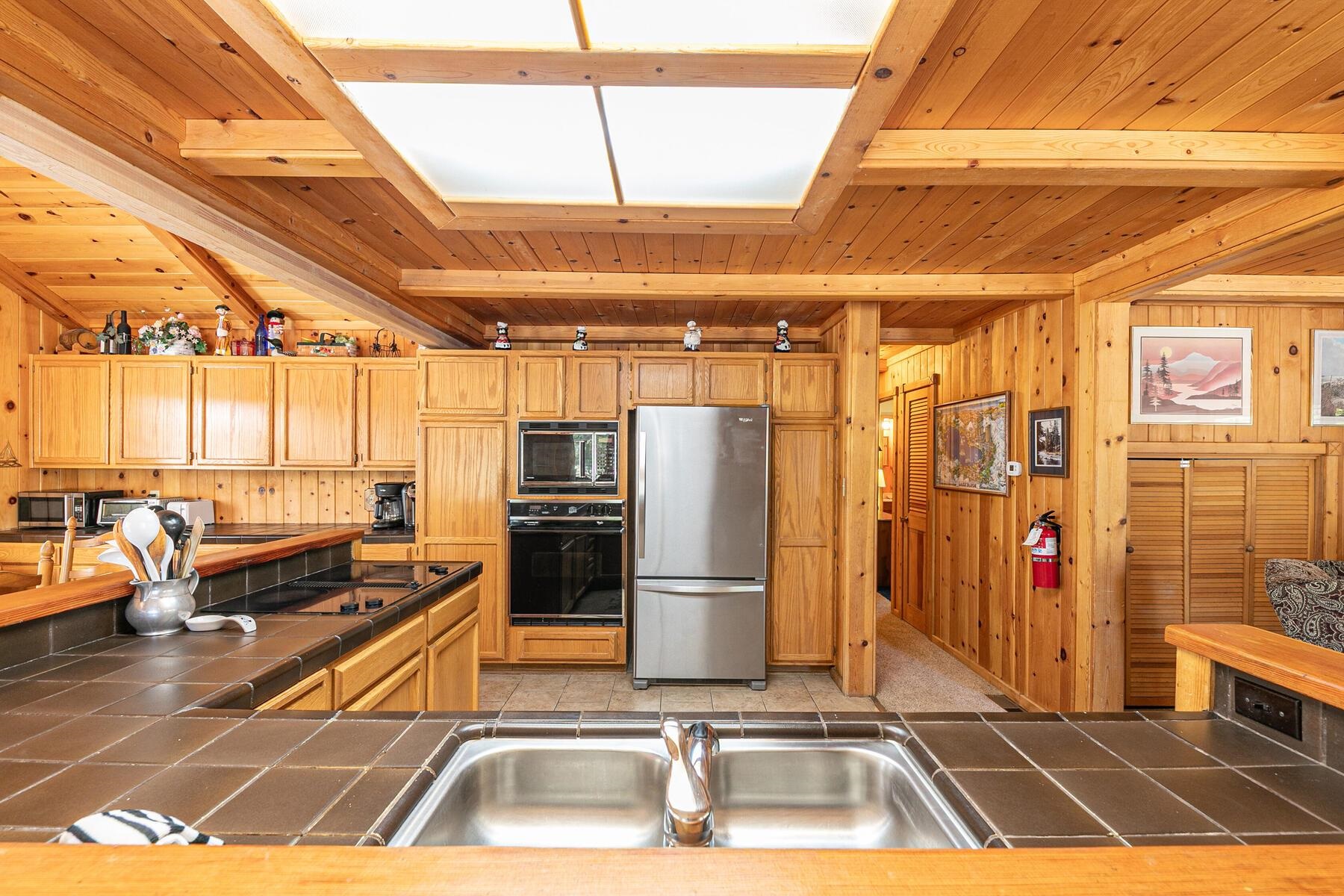 5775 Victoria Drive Carnelian Bay, CA 96140 - Photo 13 of 28 a room with gym equipment and a table