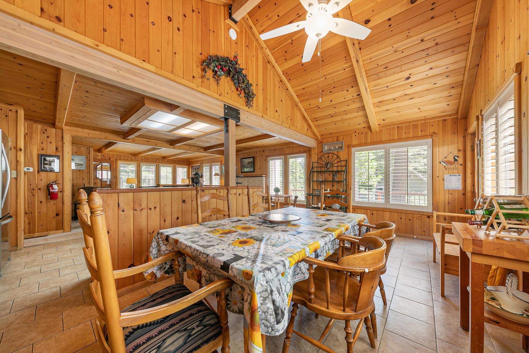 5775 Victoria Drive Carnelian Bay, CA 96140 - Photo 16 of 28 a view of a dining room with furniture window and outside view