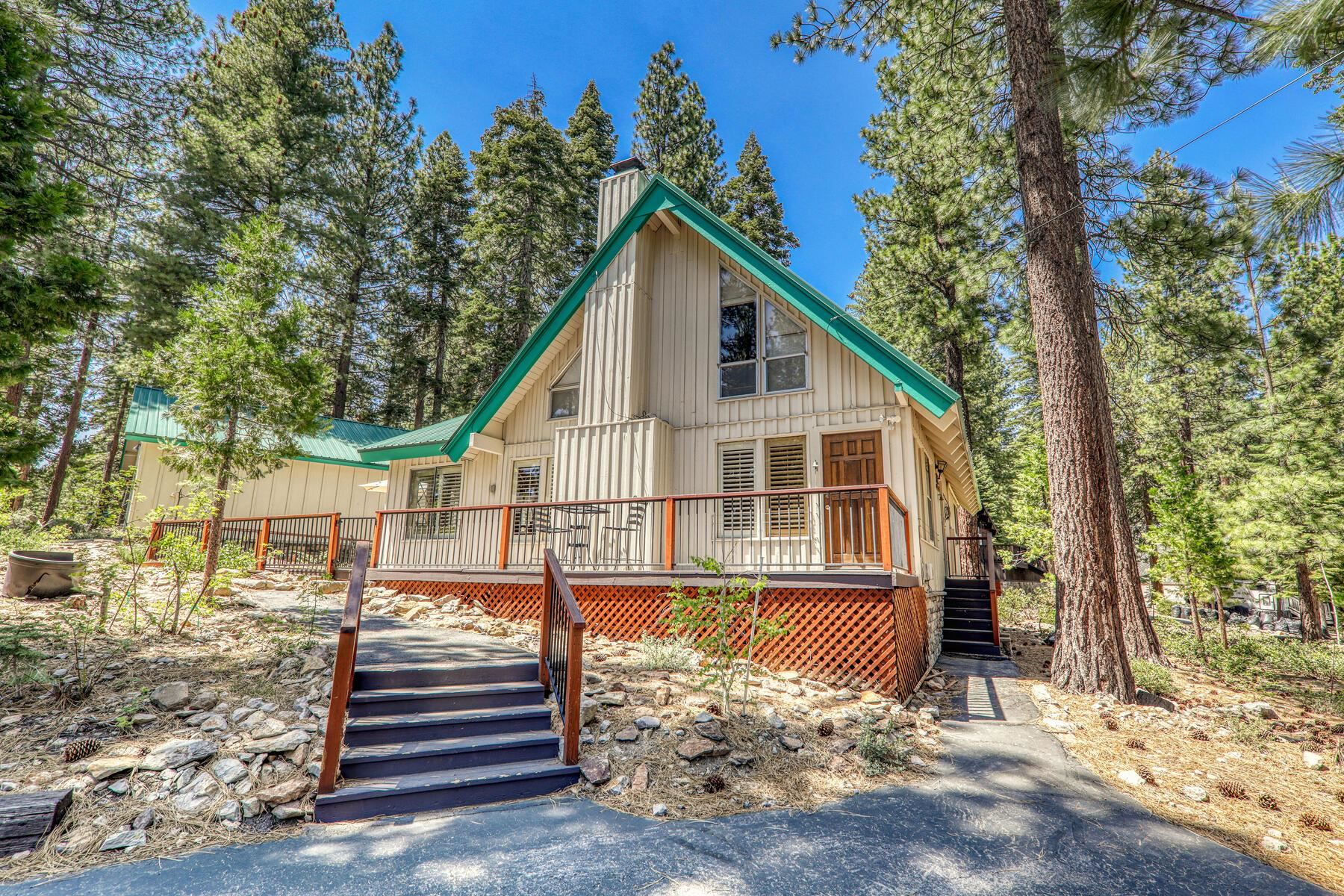 5775 Victoria Drive Carnelian Bay, CA 96140 - Photo 3 of 28 a view of a house with a yard