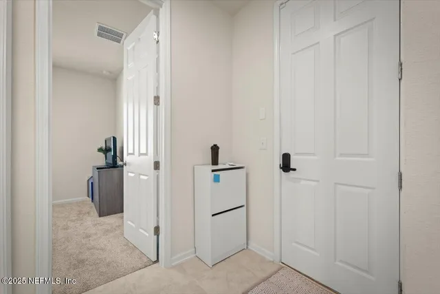 a view of a house with backyard and porch